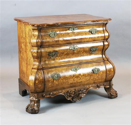 A 19th century Dutch walnut and marquetry bombe commode, W.3ft 4in. D.2ft 1in. H.2ft 9in.